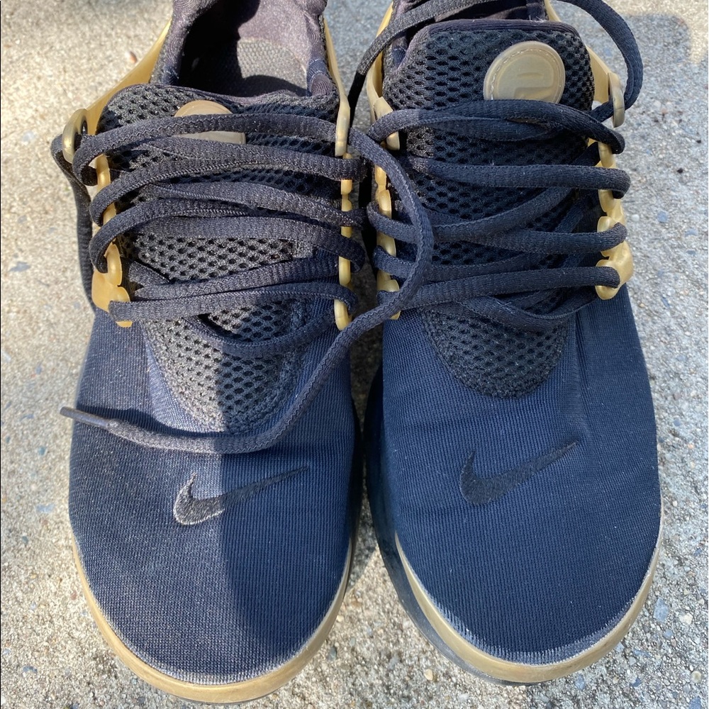Pre own Nike presto size 5 black gold